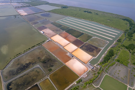 Aerial drone photo of colourful salt flats textures in Phetchaburi, Thailandの写真素材