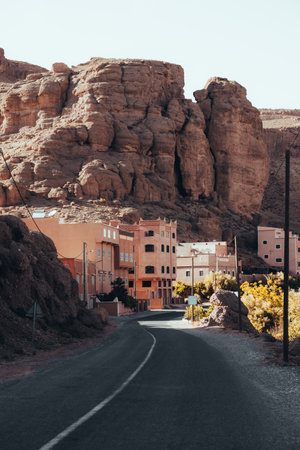 Single road through the mountains in Dades Gorge Morocco during sunsetの写真素材