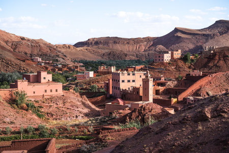 Nature, rocks, houses and mountains in Dades Gorge Morocco during sunsetの写真素材