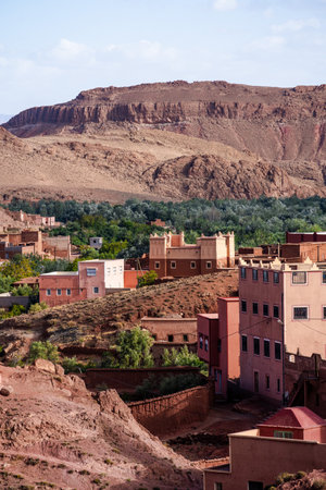 Nature, rocks, houses and mountains in Dades Gorge Morocco during sunsetの写真素材