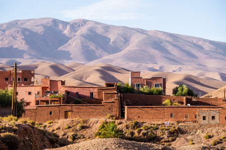 Nature, rocks, houses and mountains in Dades Gorge Morocco during sunsetの写真素材