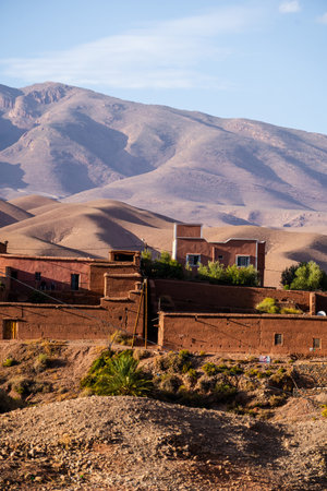 Nature, rocks, houses and mountains in Dades Gorge Morocco during sunsetの写真素材