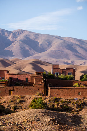 Nature, rocks, houses and mountains in Dades Gorge Morocco during sunsetの写真素材