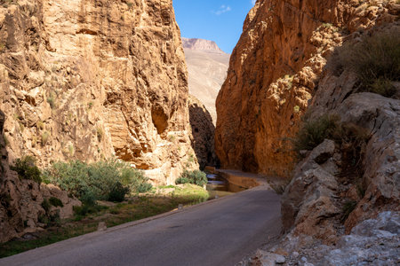 Narrow road through the Dades Gorge Valley Canyon, Atlas Mountains in Moroccoの写真素材