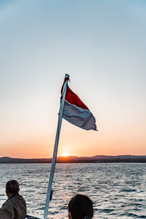 View from the ferry with Indonesian Flag, Kupang East Nusa Tenggara, Indonesia