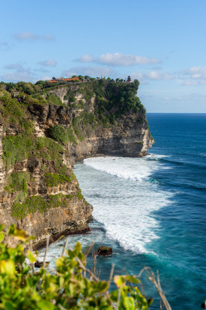 Rocky cliff coastline and ocean, sea, near Uluwatu temple in Bali, Indonesiaの写真素材