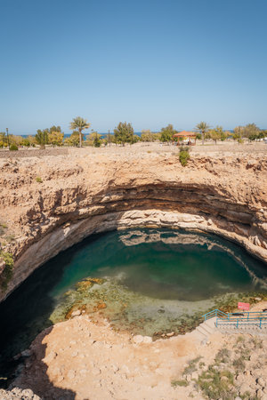 Bimmah Sinkhole, turquoise swimming spot in Oman, close to Wadi Shab and Muscatの写真素材