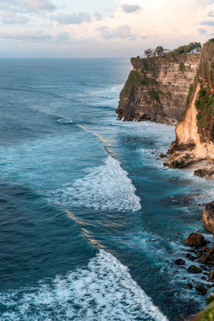 Rocky cliff coastline and ocean, sea, near Uluwatu temple in Bali, Indonesiaの写真素材