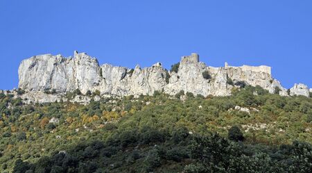 General view of chateau peyrepertuse, one of the Cathar Castles in the Languedoc, built on a high mountain ridgeの写真素材