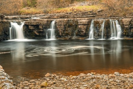 Wain Wath Force is a waterfall situated on the River Swale in the Yorkshire Dales National Park, North Yorkshire, England.の写真素材