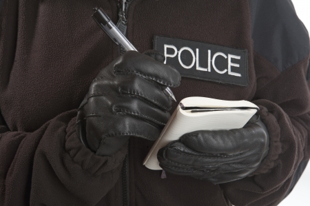 Police notebook and penの写真素材