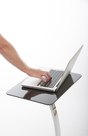 Woman using laptop computerの写真素材