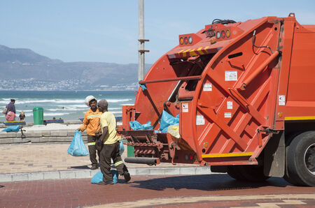 Refuse collection from coastal resort near Cape Town S Africa
