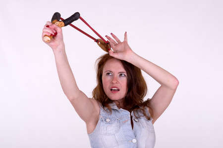 Young woman using a catapultの写真素材