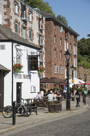 The Prospect pub and customers on Exeter Quayside Devon UKのeditorial素材