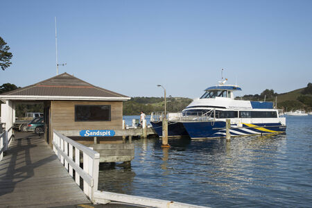 Wharf at Sandspit North Island NZ and Royal Mail run cruise boat New Zealandのeditorial素材