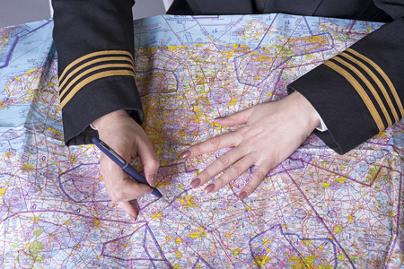 Airline officer planning a route