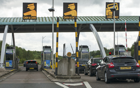 Pay station on the M6 toll motorway at Weeford Park UKのeditorial素材