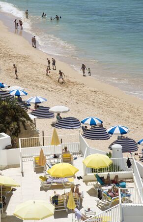 The beach in the Algarve town of Armacao de Pera southern Portugalのeditorial素材