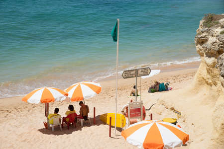 Lifeguards on an Algarve beach southern Portugalのeditorial素材