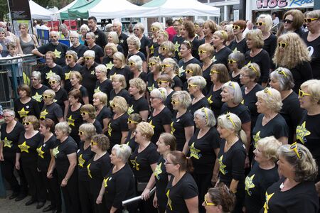 Rock Choir at the annual Winchester Hat Fair in Hampshire UK 2015のeditorial素材