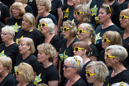 Rock Choir at the annual Winchester Hat Fair in Hampshire UK 2015のeditorial素材