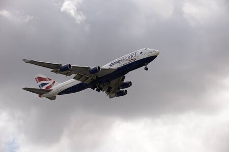 Boeing 747 jet preparing to land wheels down on final approach