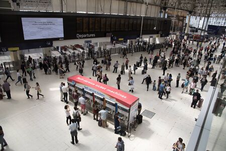Railway station concourse showing self service ticket machines and passengersのeditorial素材