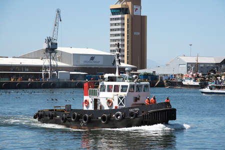 Ocean going tug Kestrel underway Cape Town harbour South Africaのeditorial素材