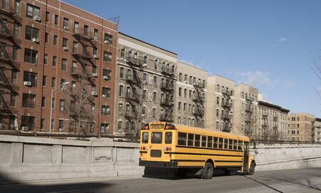 Yellow school bus on the Upper West Side new york USA