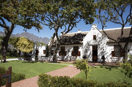 FRANSCHHOEK WESTERN CAPE SOUTH AFRICA - APRIL 2016 - A Cape Dutch style house on the main street in Franschhoek in the Western Cape region of Southern Africaのeditorial素材