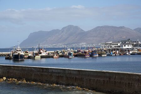 KALK BAY WESTERN CAPE SOUTH AFRICA - APRIL 2016 - The fishing harbor seen over the seawall at Kalk Bay in the Western Cape Southern Africaのeditorial素材