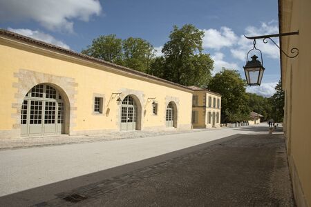 Margaux France - August 2016 - Historic outbuildings housing offices at the Chateau Margaux winery in the Medoc region of Bordeaux Franceのeditorial素材