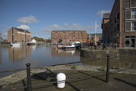 Gloucester Docks Gloucestershire England UK - October 2016 - Refurbished warehouses on the boat lined main basin of Gloucester Docksのeditorial素材