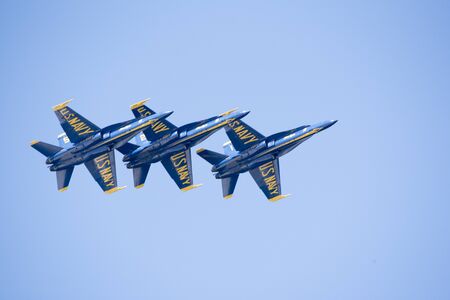 Pensacola Florida USA - October 2016 - Military jets practice flying in formation seen from Santa Rosa Islandのeditorial素材