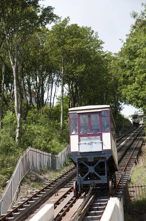 The Babbacombe Cliff Railway which transports passengers to Oddicombe Beach at Torquay on the English Riviera in Devon UKのeditorial素材