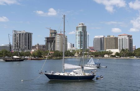 Yacht moored in the north yacht basin with a skyline view of St Petersburg Florida USAのeditorial素材