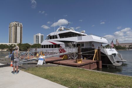 The North Yacht Basin in St Petersburg Florida USA.  A stern view of the fast passenger ferry...