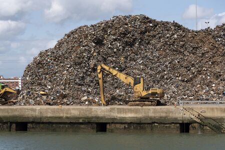 Pile of scrap metal waiting to be exported to China for melting down. Southampton Docks UK August 2017のeditorial素材