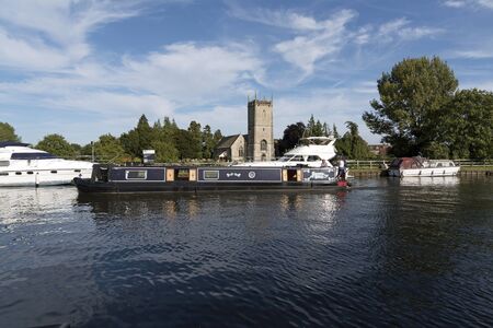 The Gloucester & Sharpness Canal at Frampton on Severn in Gloucestershire England UK. August 2017. Boats on the canal on a summer dayのeditorial素材