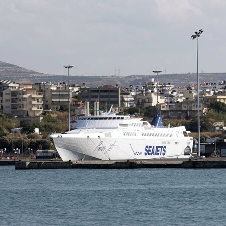 The Port of Heraklion, Crete, Greece, October 2017. A high speed ferry Paros jet alongside a berth.のeditorial素材