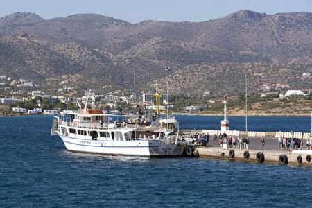 Agios Nikolaos, Crete, Greece.  The port area and passenger ferry which sails to Spinalonga Islandのeditorial素材