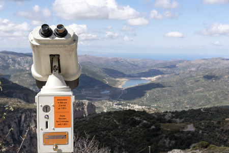 View across mountains of a water reservoir from the mountain road at Ano Kera, Lasithi, Crete, Greece. October 2017のeditorial素材