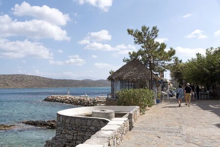 Seafront walkway at the seaside resort of Plaka, Lasithi, Crete, Greece. October 2017のeditorial素材