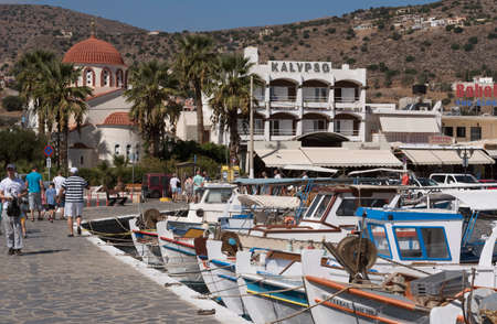 The fishing boat harbour at Elounda a seaside resort in northern Crete, Greece. October 2017のeditorial素材