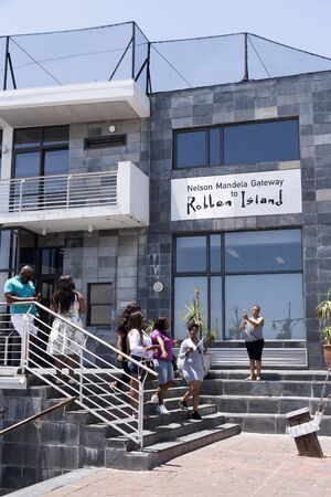 Cape Town  waterfront Western Cape South Africa. December 2017. Tourists at the Nelson Mandela Gateway wait to board a ferry to Robben Islandのeditorial素材