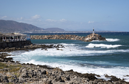 Sisi, Crete, Greece. 2017. Seafront resaurant  on the harbour entrance from the Sea of Creteのeditorial素材