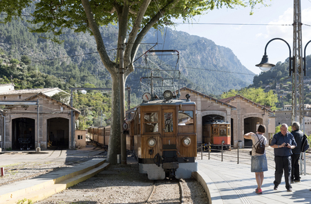 Soller Station, Mallorca, Spain. April 2018. Electric locomotive pulling train from Palma arrives in Sollerのeditorial素材