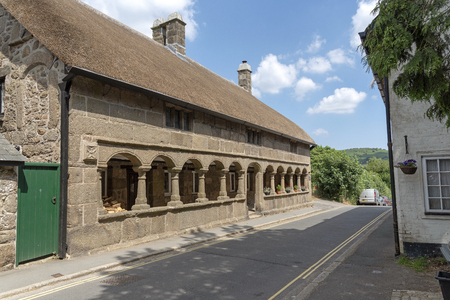 Alms housing on Cross Street in Moretonhampstead, Devon, England UKのeditorial素材