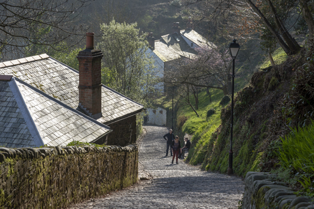 Clovelly, North Devon, England, UK. February 2019. A steep cobblestone road leading to the small village of Clovelly a major coastal tourist attractionのeditorial素材